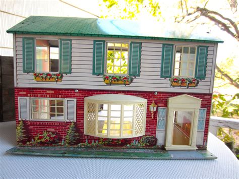 vintage large metal tin doll house 1960's|tin doll houses from 1960s.